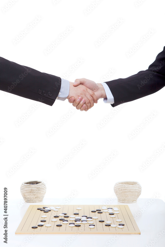 Two business men shaking hands