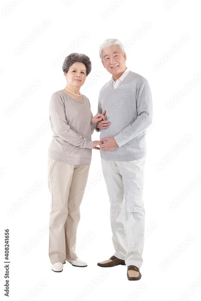 Oriental old couple walking hand in hand