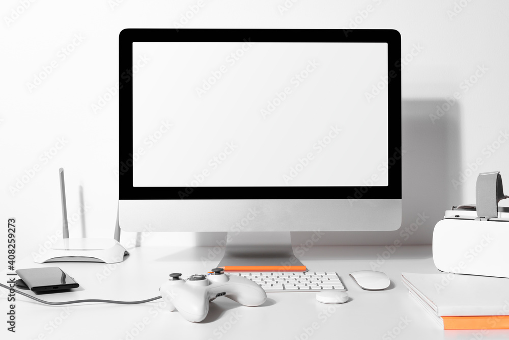 Blank computer screen on a table