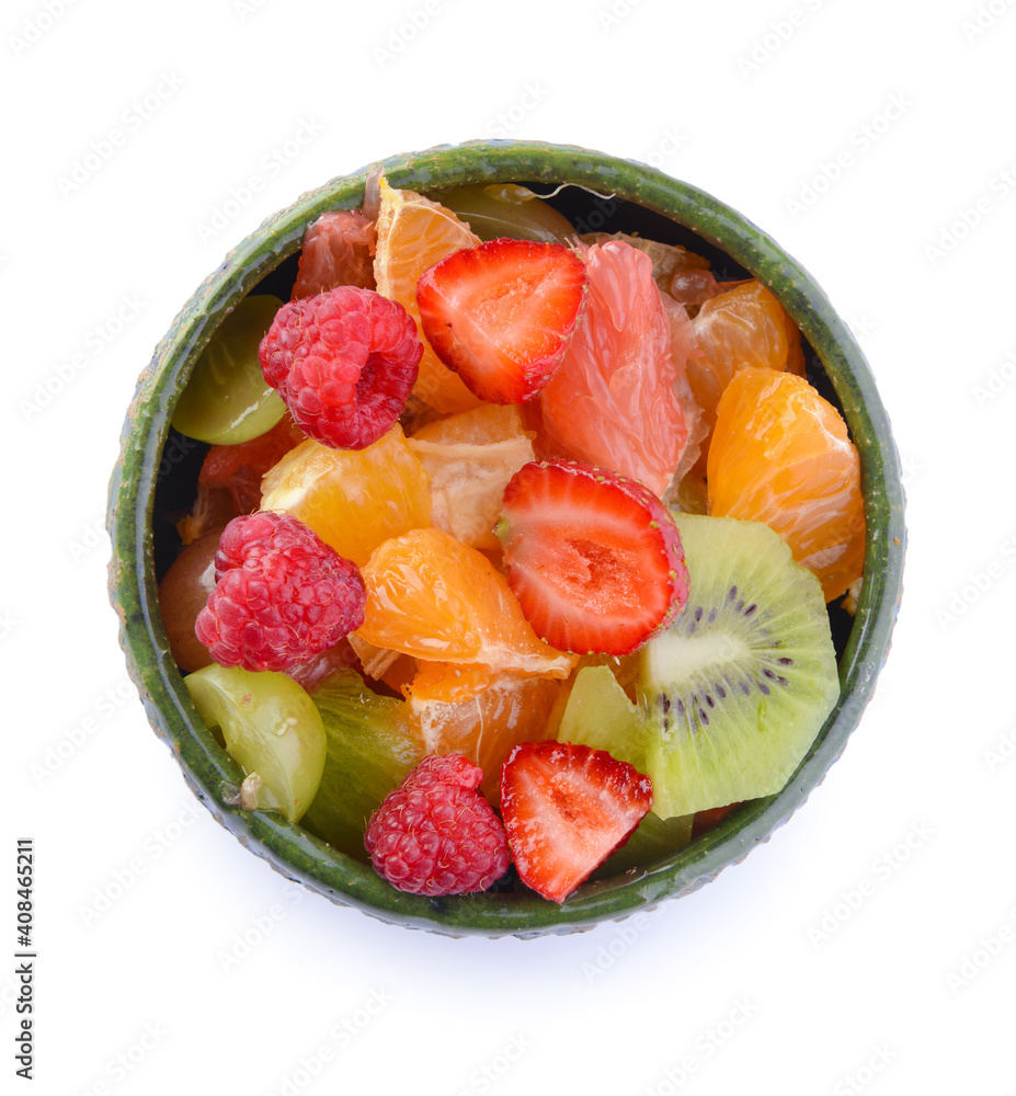 Bowl with fruit salad on white background