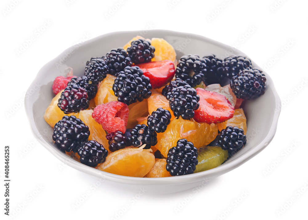 Bowl with fruit salad on white background