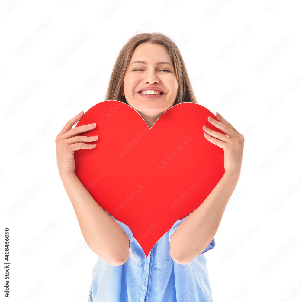 Young woman with red heart on white background