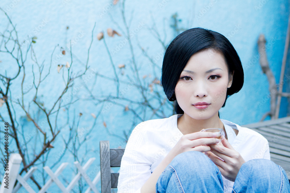 The young woman in the outdoor tea