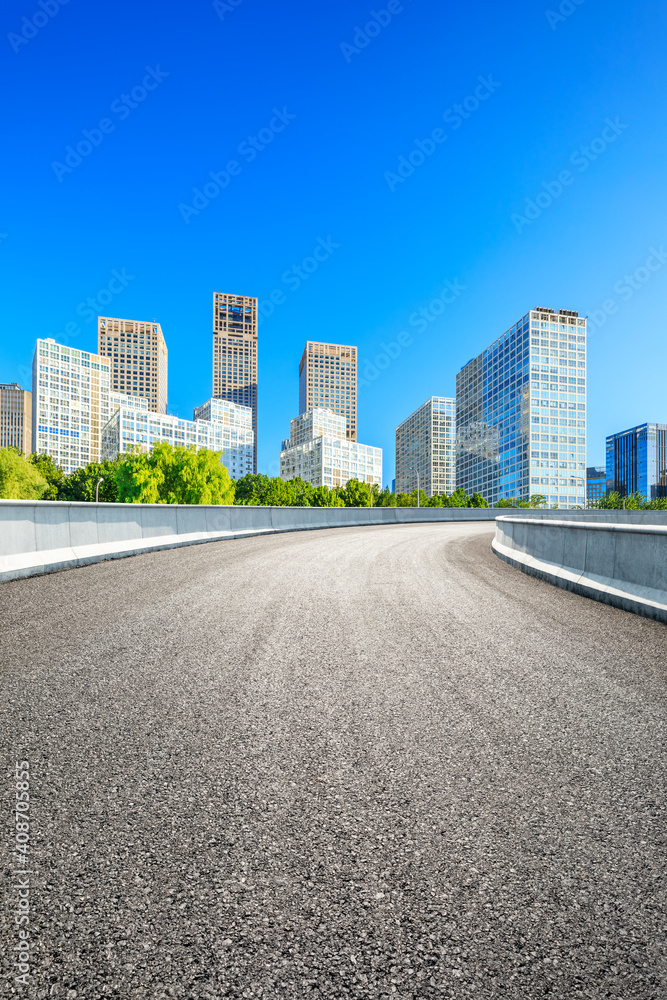 Asphalt road and modern city commercial buildings in Beijing,China.