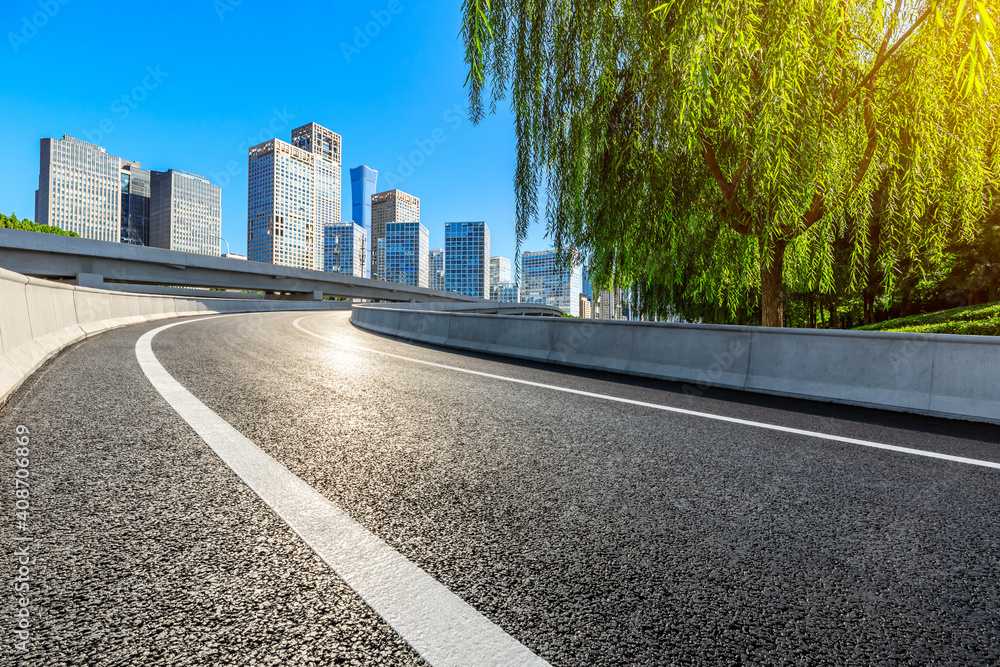 Asphalt road and modern city commercial buildings in Beijing,China.