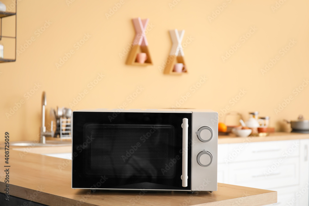 Microwave oven on kitchen counter