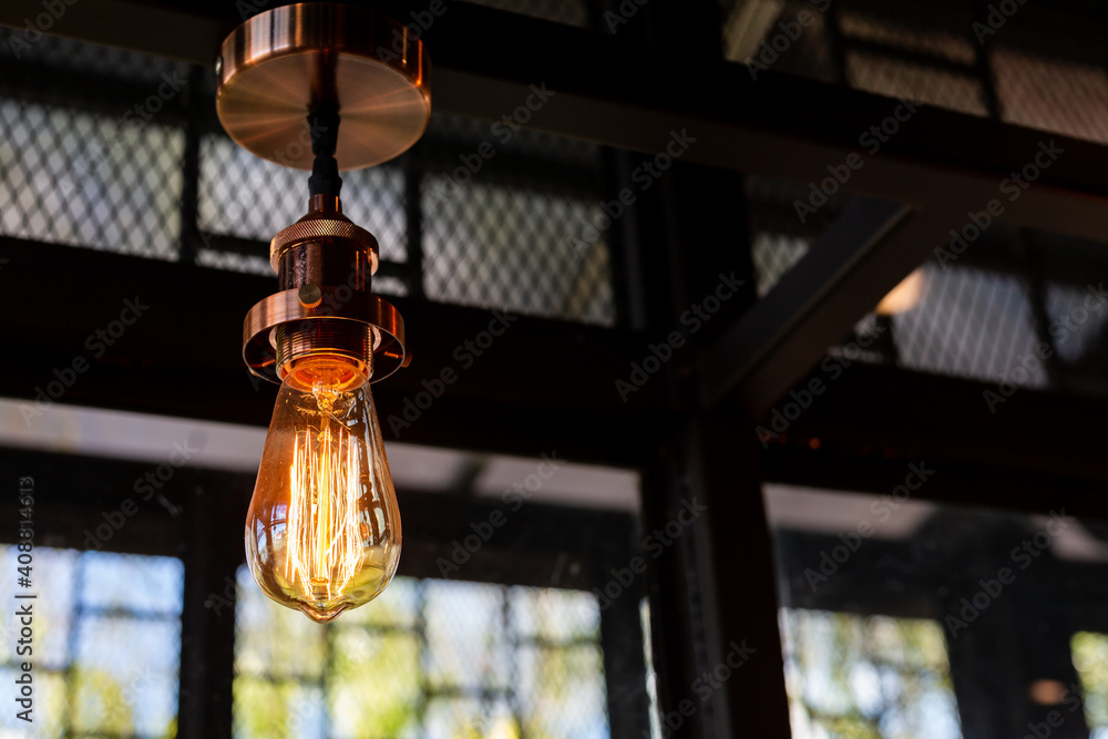 Close up of Illuminated light bulb with copy space.