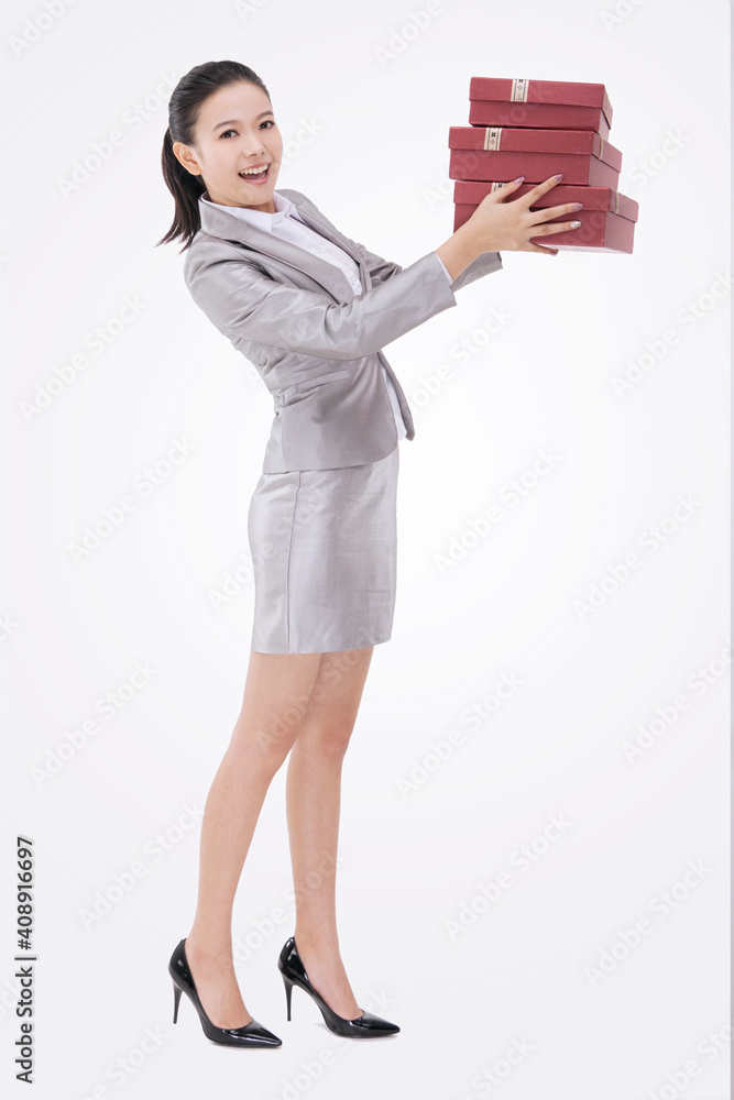 Oriental business woman with gift box