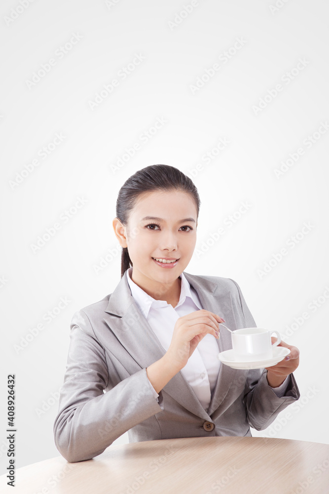 Business woman drinking coffee