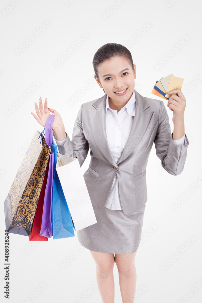 Oriental business woman with credit card shopping