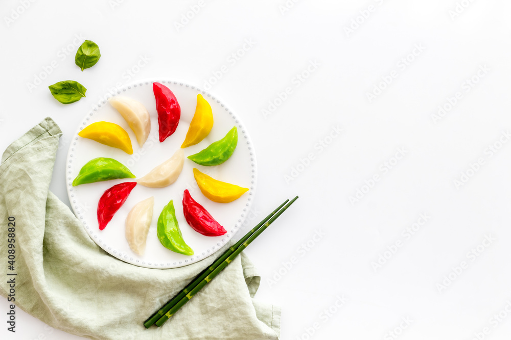 Steamed dumplings tio view. Vegetables ravioli on white plate