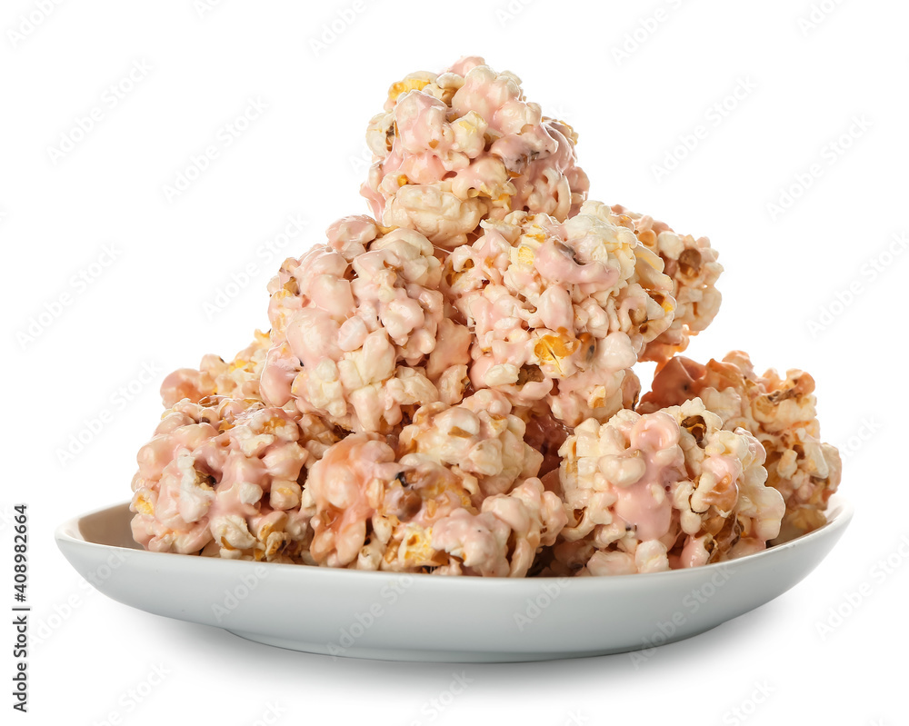 Plate with tasty popcorn balls on white background