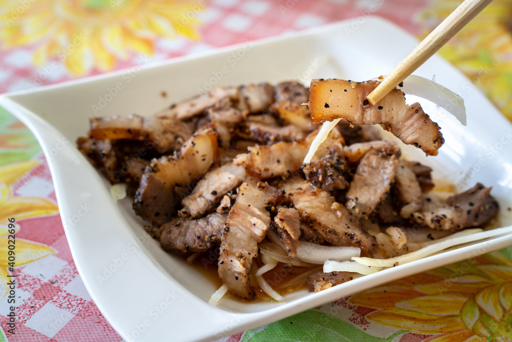 Delicious Taiwanese salted pork food with onion in restaurant.