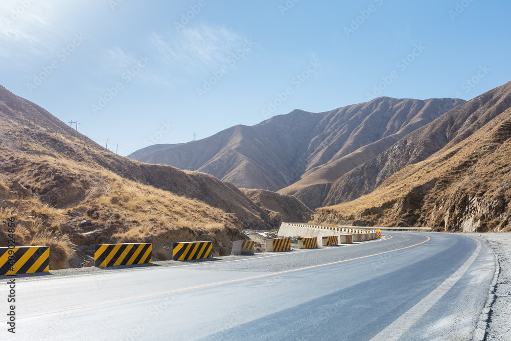 winding road in the autumn plateau