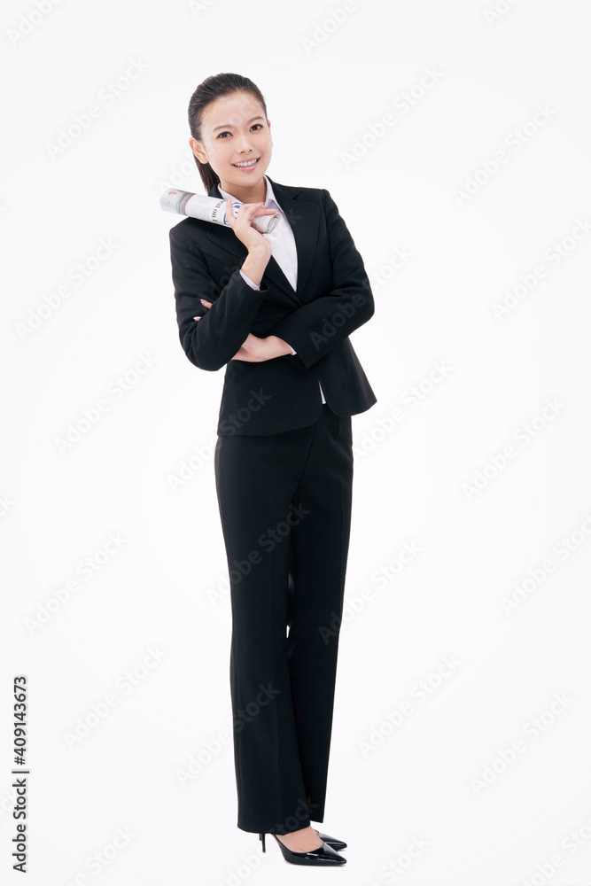 Fashion business woman holding a newspaper in English