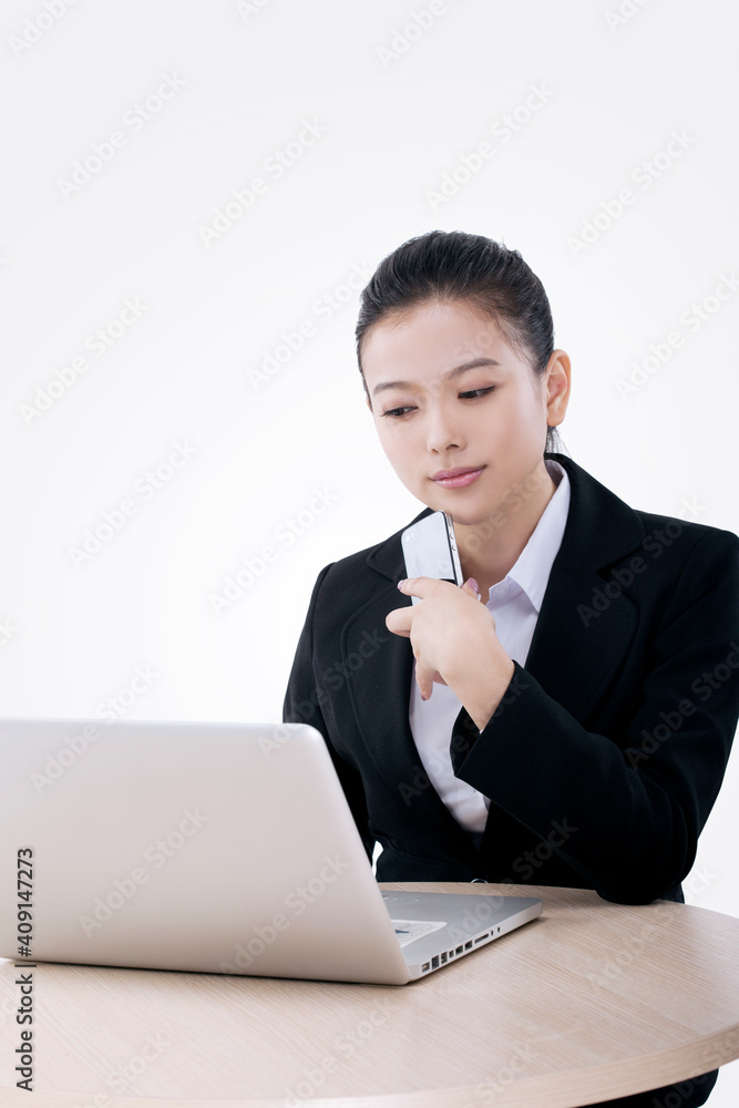 Oriental fashion business woman using computer