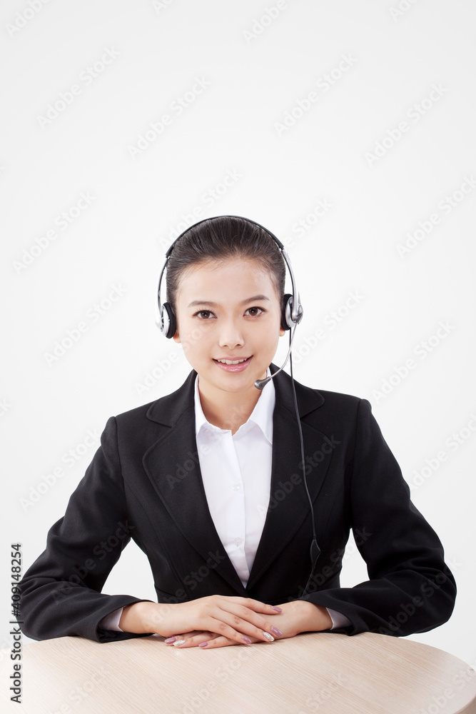 Oriental business lady wearing headset