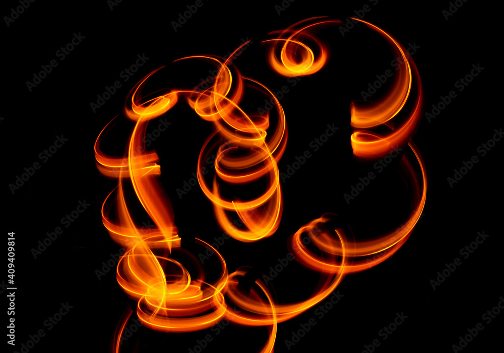 Light wave trail path, vibrant neon gold color in abstract swirls on a black background