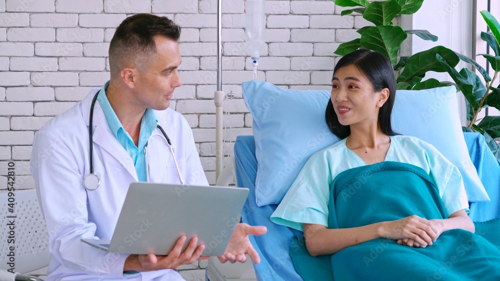 Doctor in professional uniform examining patient at hospital or medical clinic. Health care , medica