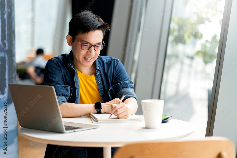 Smart attractive positive asian business male wearing glasses work remote new normal lifestyle hand 