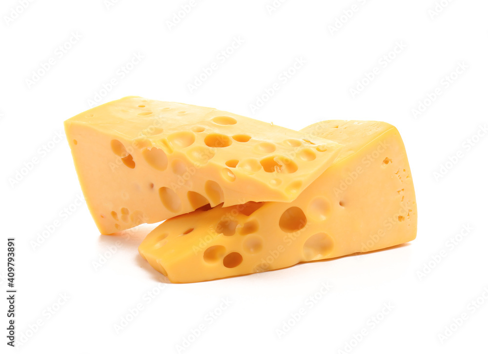 Pieces of tasty cheese on white background