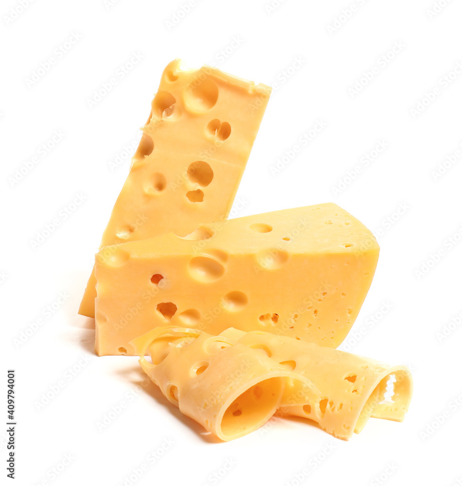 Pieces of tasty cheese on white background