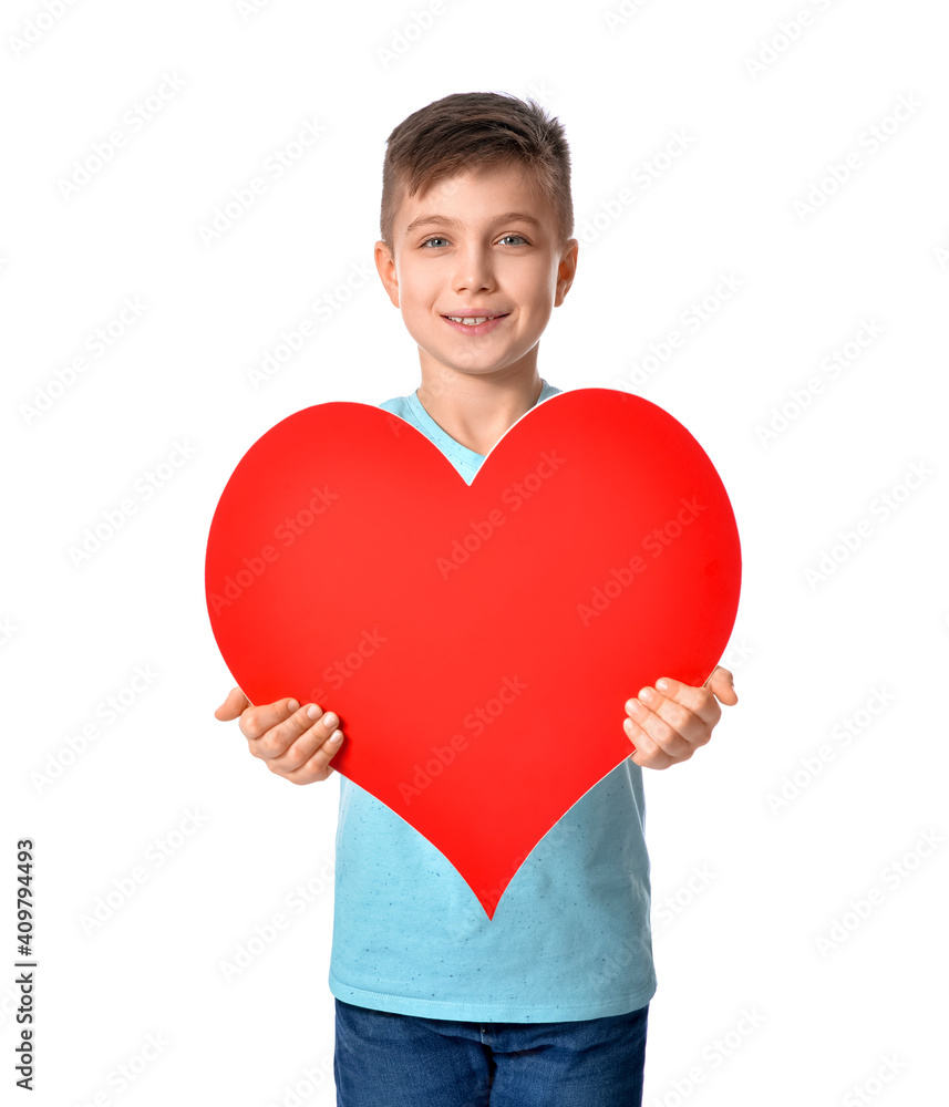 Cute little boy with red heart on white background