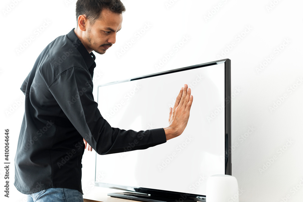 Man touching smart TV screen