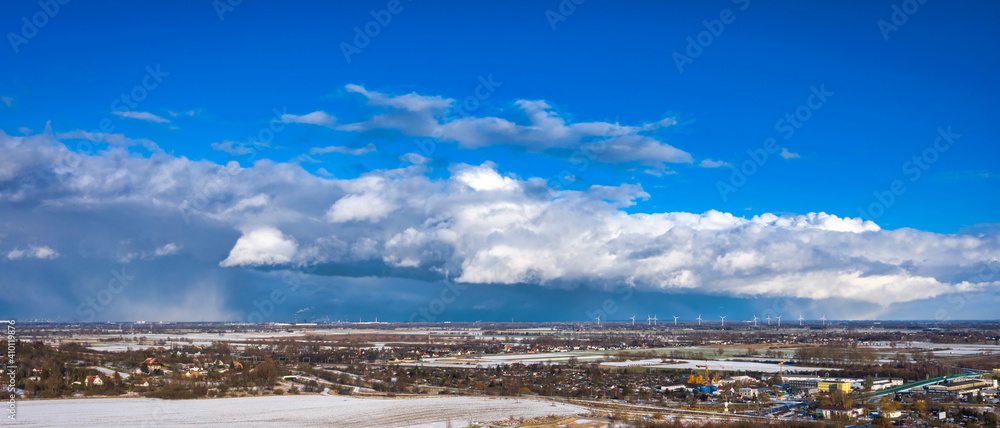 Beautiful winter scenery with amazing clouds, Poland.