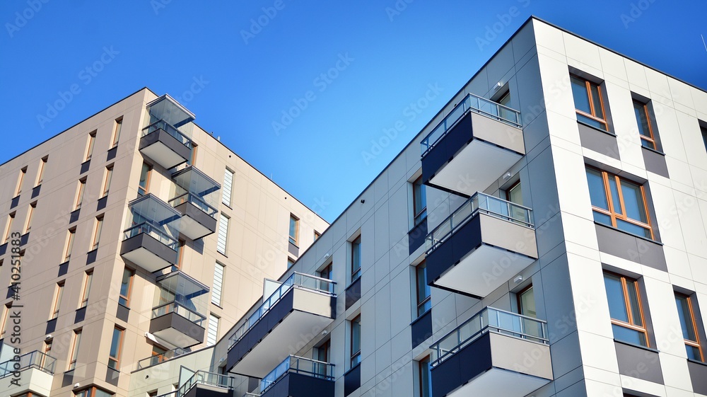 Modern apartment building in sunny day. Exterior, residential house facade.