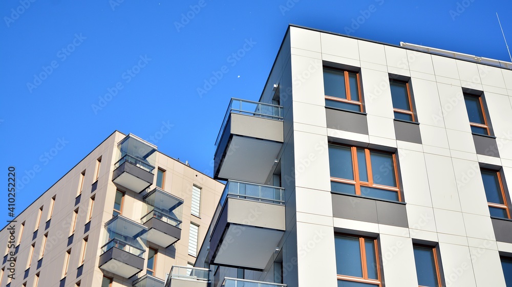 Modern apartment building in sunny day. Exterior, residential house facade.