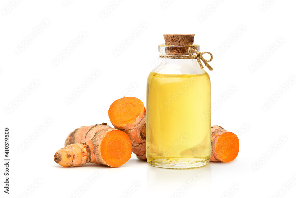 Turmeric (Curcuma longa Linn) essential oil with  rhizome isolated on white background.