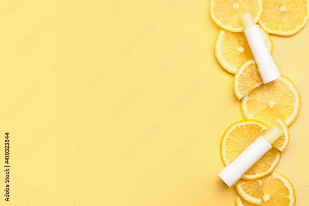 Natural lip balms with lemon on color background