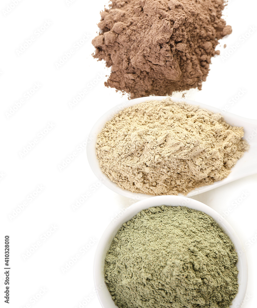 Different henna powder on white background