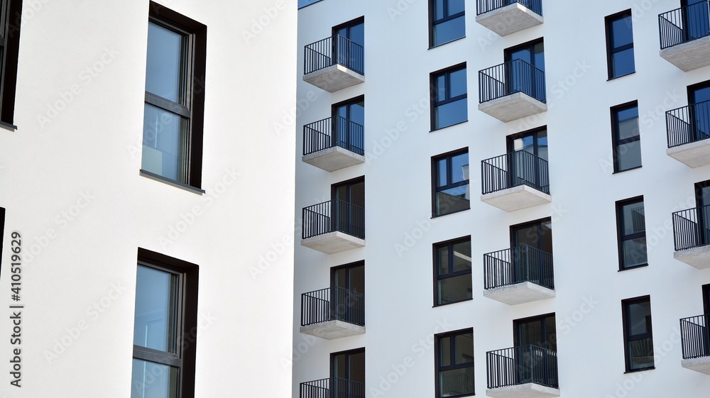 Modern apartment building in sunny day. Exterior, residential house facade.