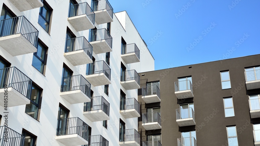 Modern apartment building in sunny day. Exterior, residential house facade.