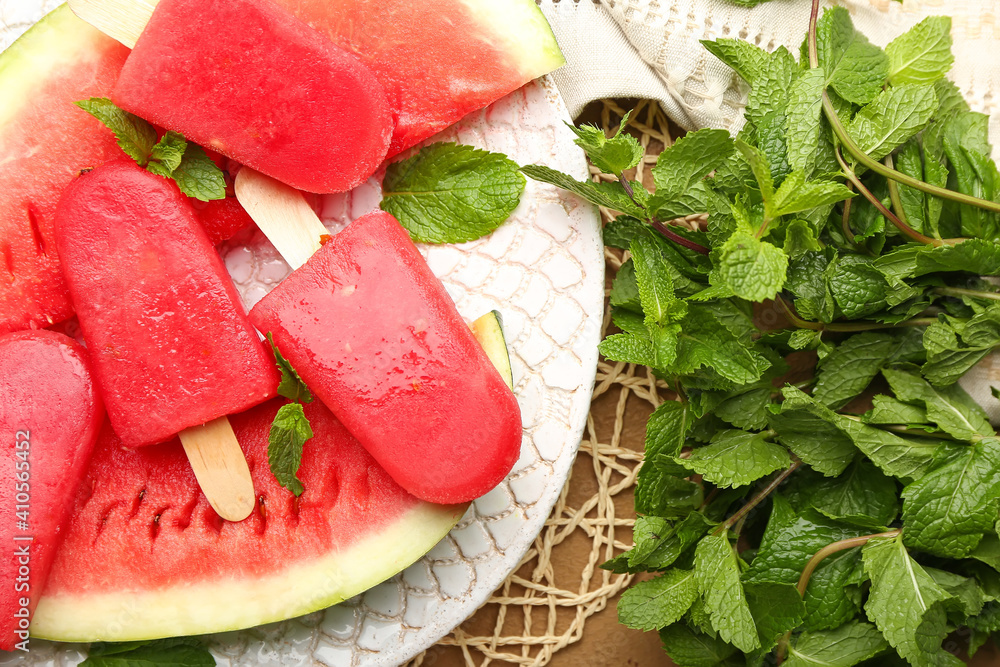 Composition with watermelon ice cream on table