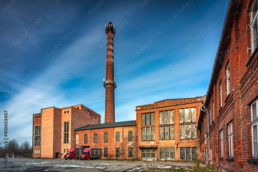 Ruins of a brick sugar factory in Pruszcz Gdański in winter, Poland