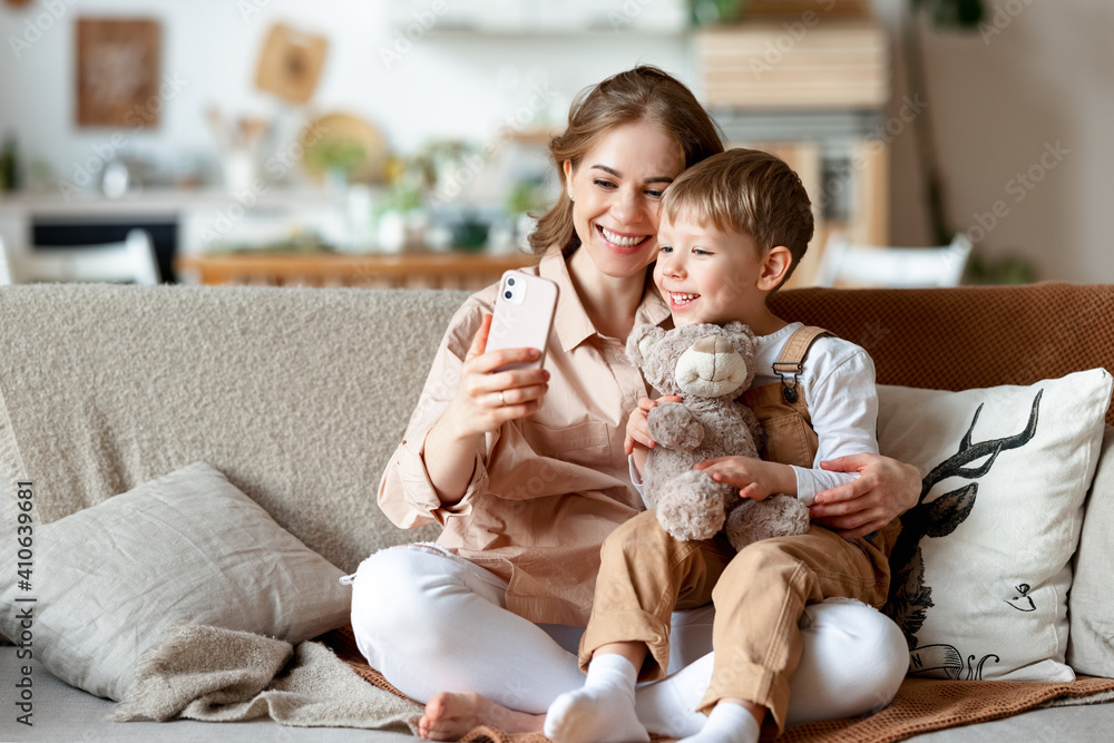 Mother taking selfie with  child