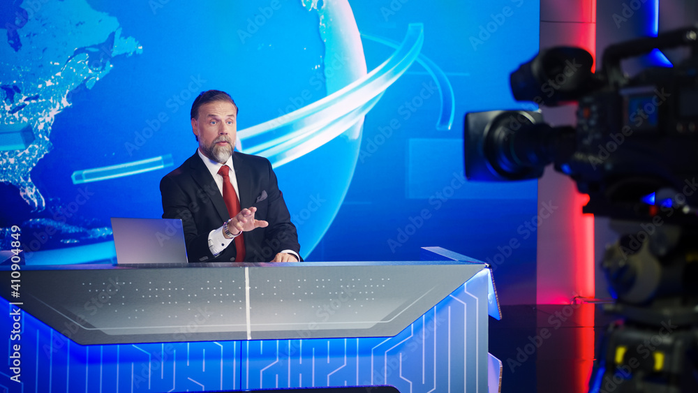 Live News Studio with Professional Male Newscaster Reporting on the Events of the Day. TV Broadcasti