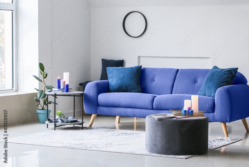 Interior of modern living room with blue sofa