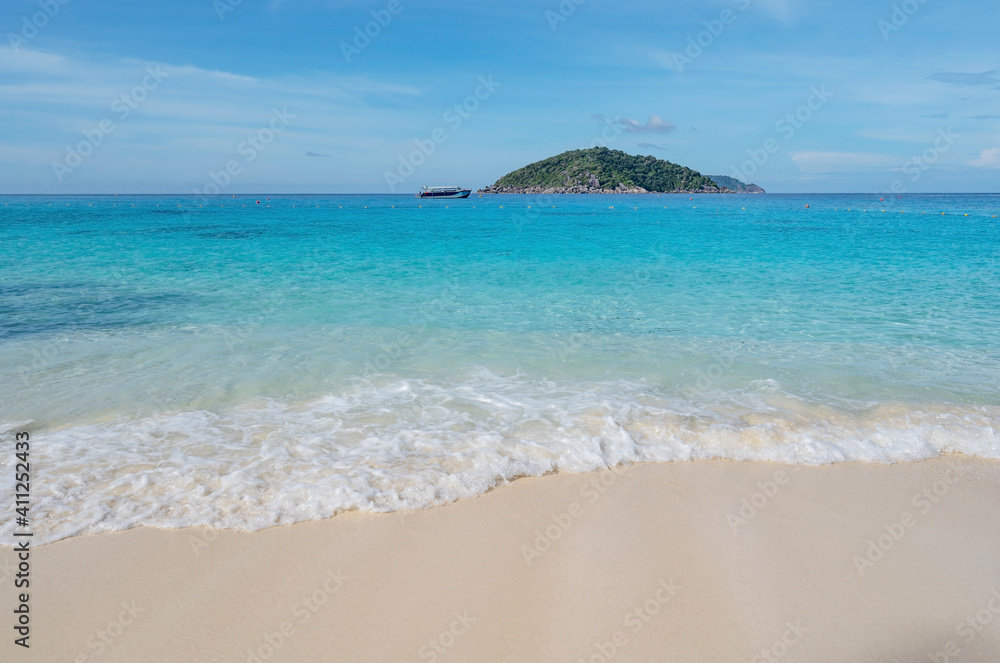 Beautiful beach and tropical sea with wave crashing on sandy shore Small island archipelago at Simil