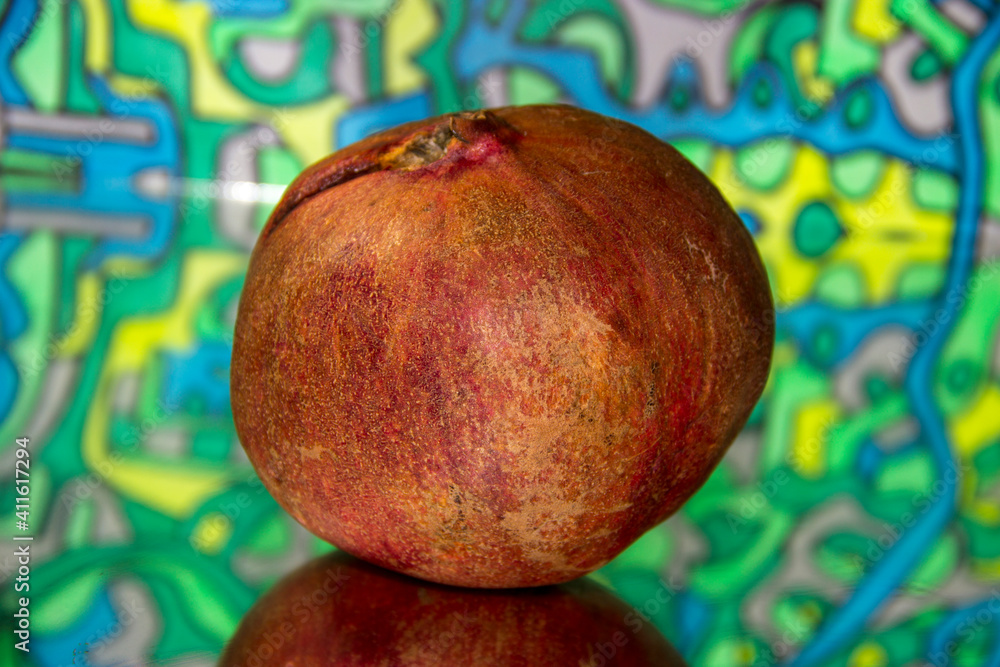 Pomegranate on an abstract background.