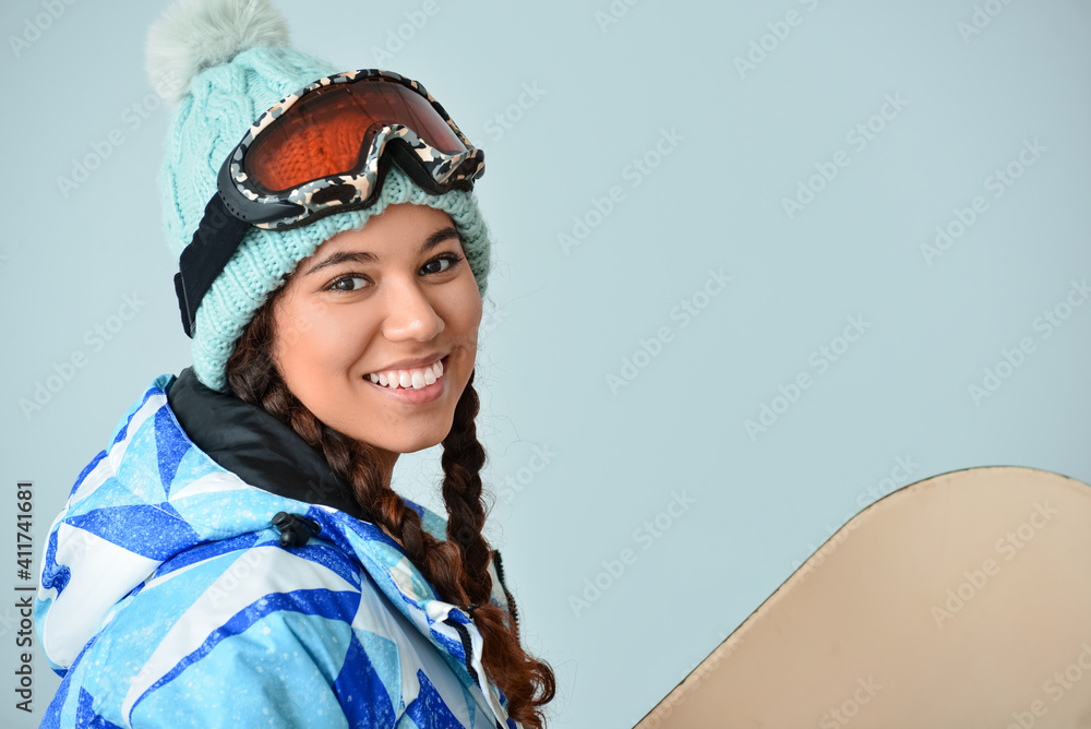 彩色背景的女单板滑雪运动员