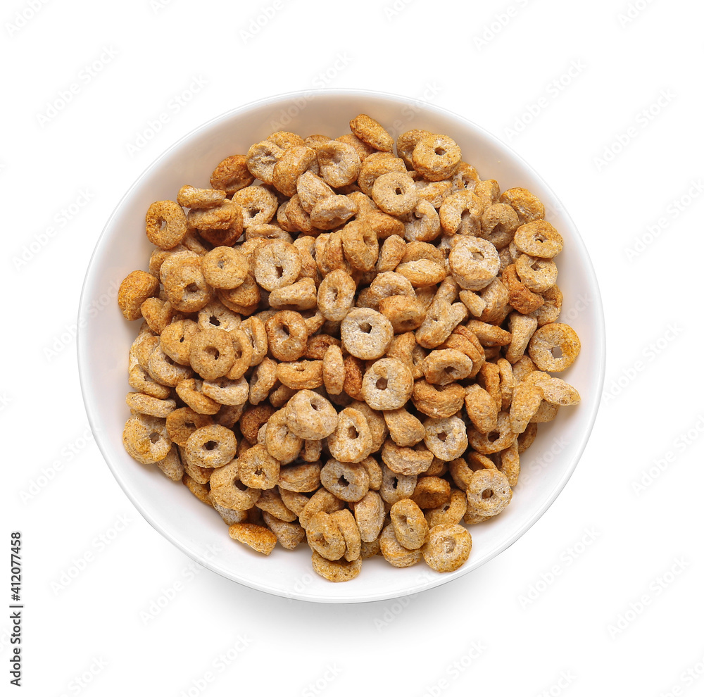 Tasty breakfast cereals in bowl on white background