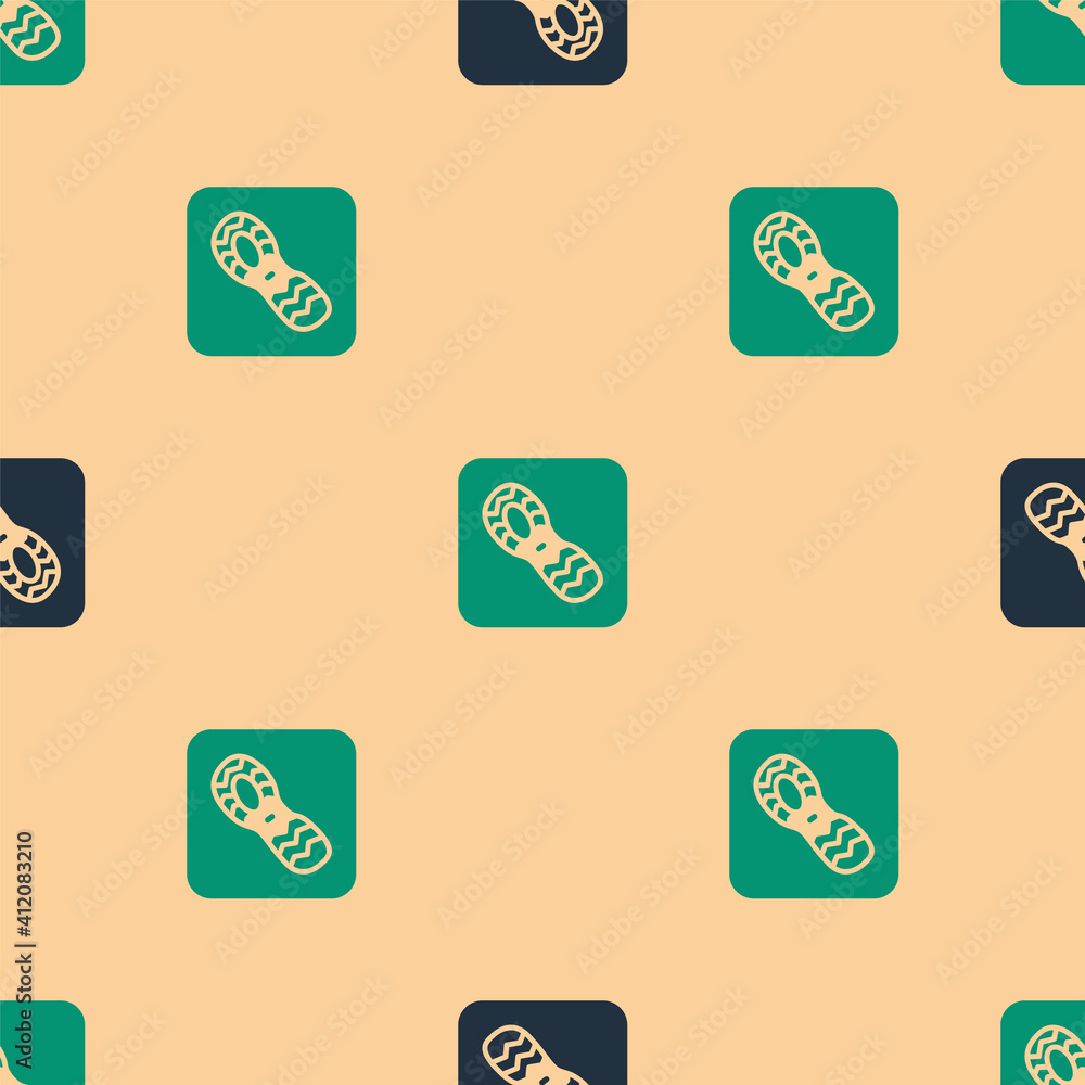 Green and black Human footprints shoes icon isolated seamless pattern on beige background. Shoes sol