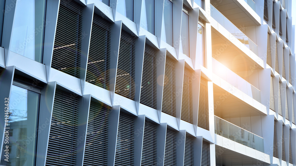 Modern office block with sunny beautiful sky. Bright outlook for business.