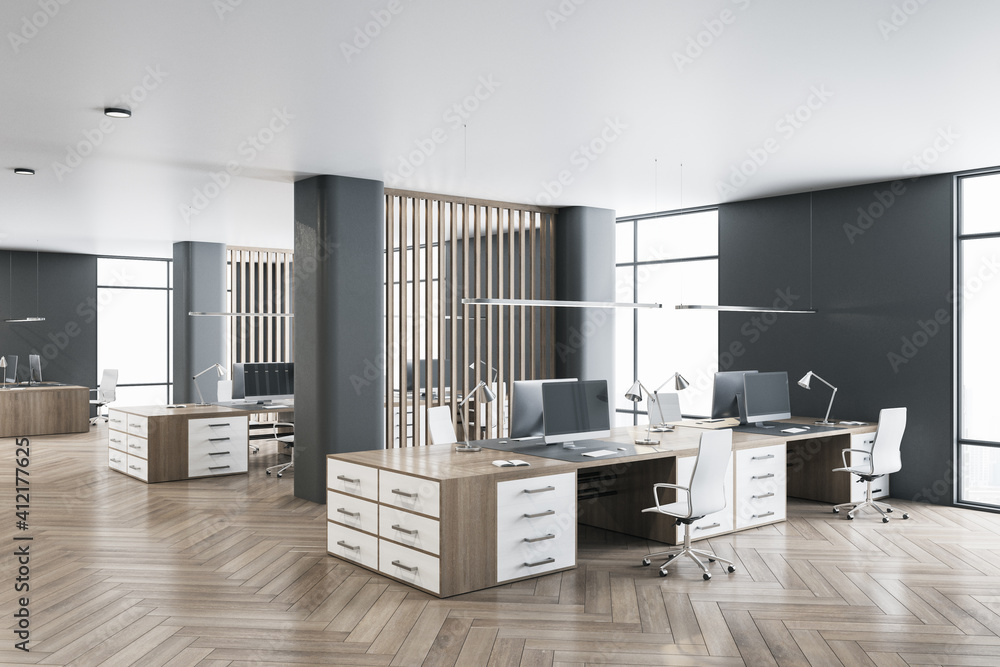 Modern minimalistic eco style openspace office with dark wood parquet, wooden furniture, dark walls,