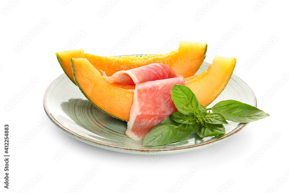 Plate with delicious melon and prosciutto on white background