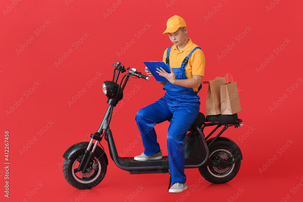 Courier of food delivery service on color background